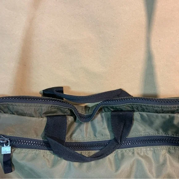 Guess Green Messenger Bag with Adjustable Strap and zipper pockets